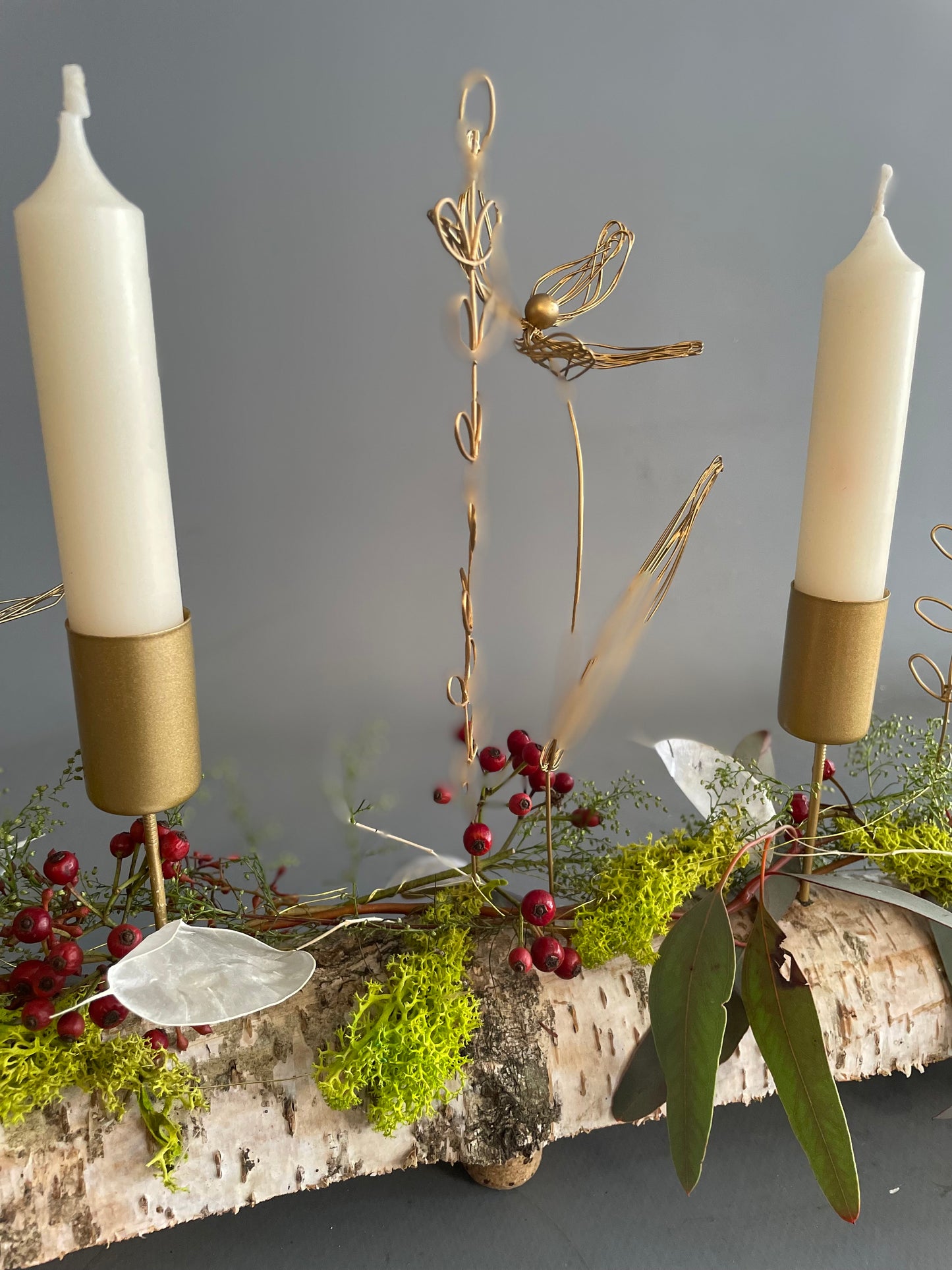 Wiese auf Birke mit Kerze